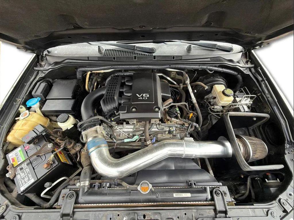 used 2013 Nissan Frontier car, priced at $12,998