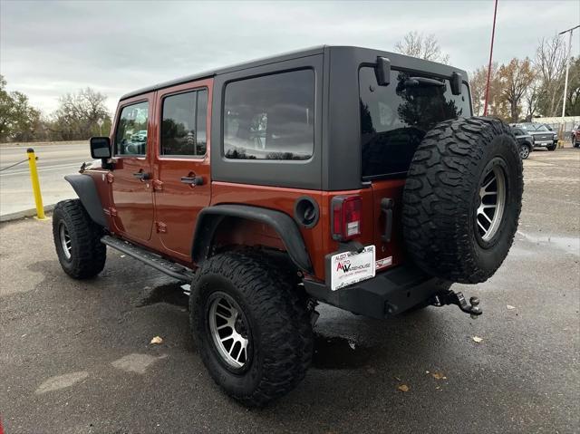 used 2014 Jeep Wrangler Unlimited car, priced at $26,998