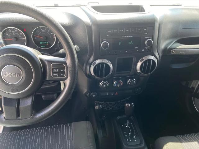 used 2012 Jeep Wrangler car, priced at $15,299