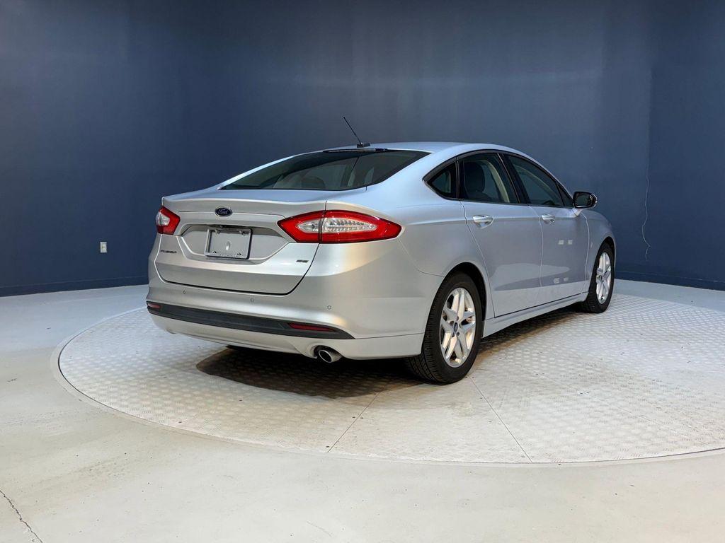 used 2016 Ford Fusion car, priced at $5,998