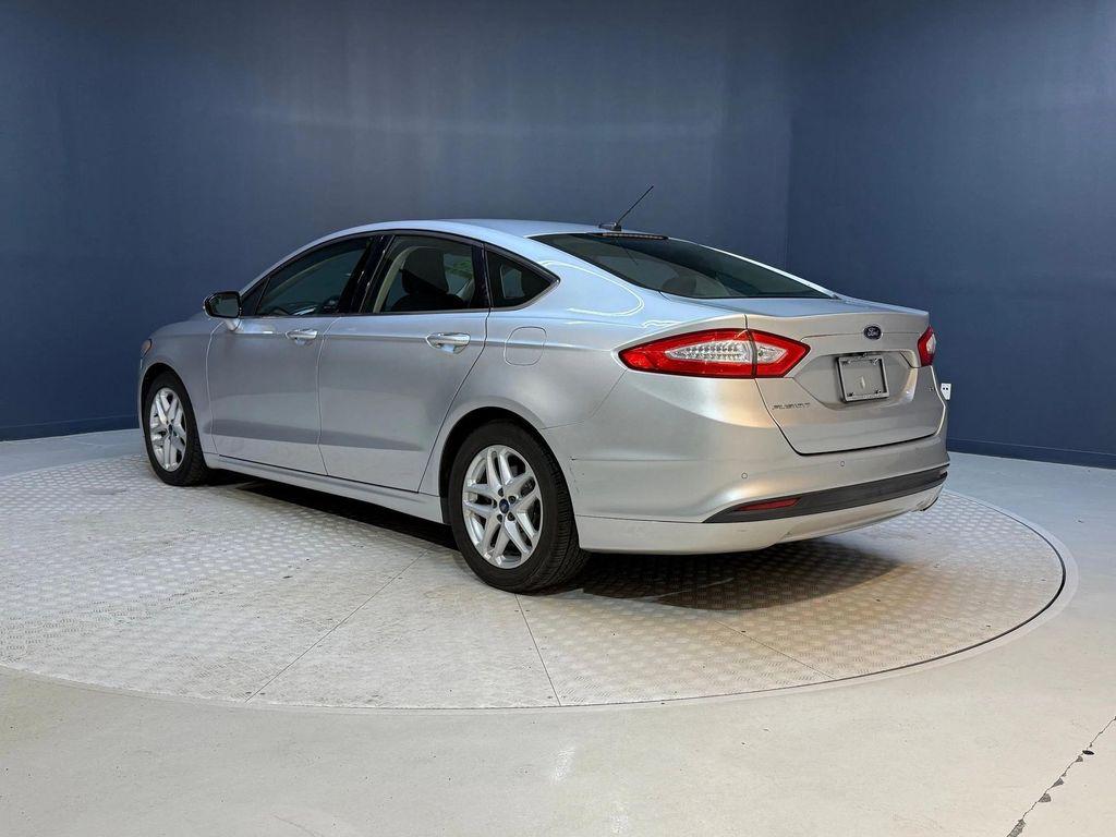used 2016 Ford Fusion car, priced at $5,998