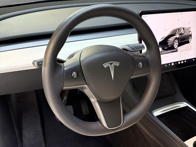 used 2024 Tesla Model Y car, priced at $27,998