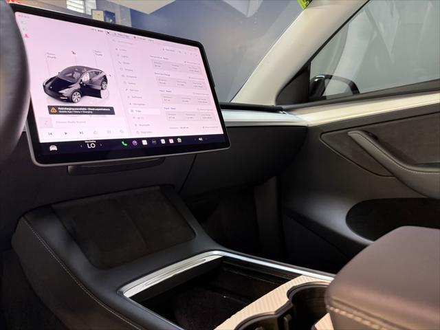used 2024 Tesla Model Y car, priced at $27,998