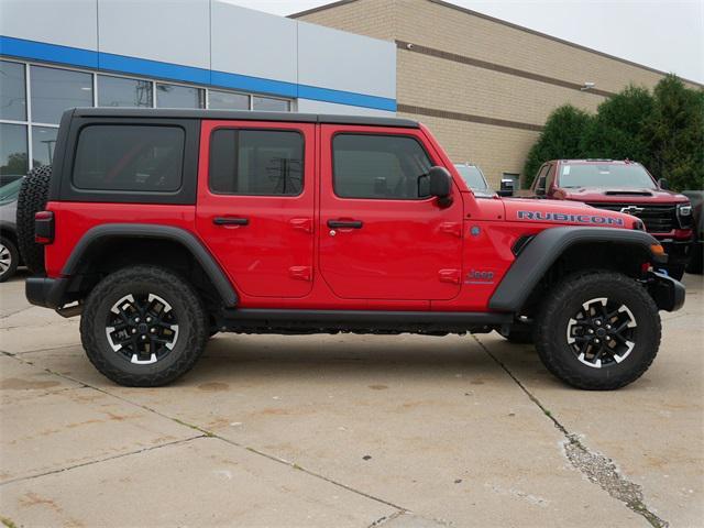 used 2024 Jeep Wrangler 4xe car, priced at $33,997