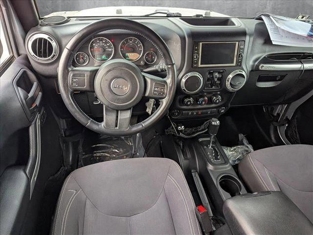 used 2016 Jeep Wrangler Unlimited car, priced at $21,909