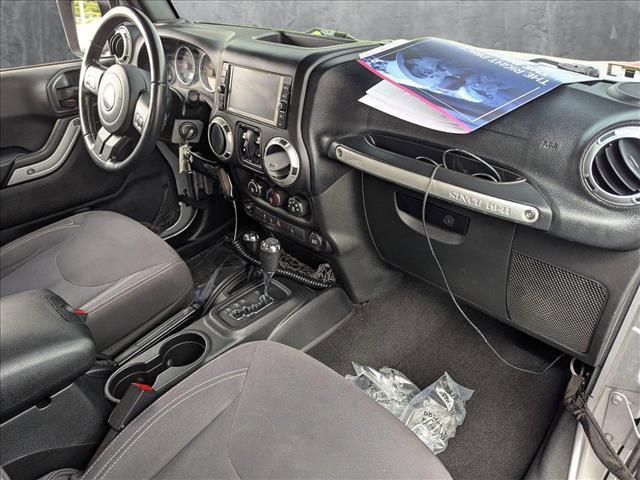 used 2016 Jeep Wrangler Unlimited car, priced at $21,909