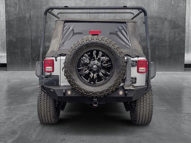 used 2016 Jeep Wrangler Unlimited car, priced at $21,909