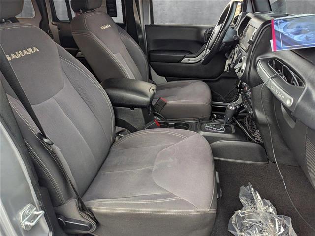 used 2016 Jeep Wrangler Unlimited car, priced at $21,909