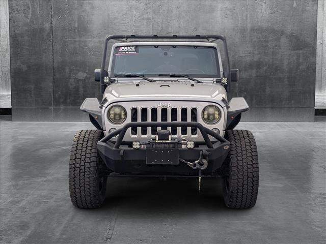used 2016 Jeep Wrangler Unlimited car, priced at $21,909