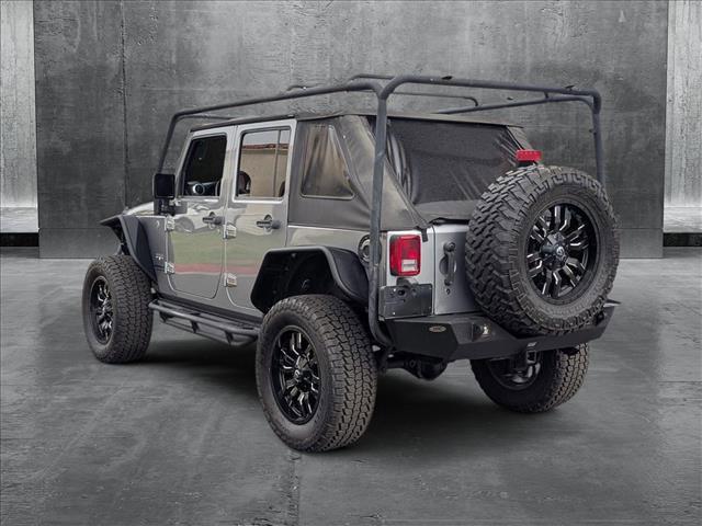 used 2016 Jeep Wrangler Unlimited car, priced at $21,909