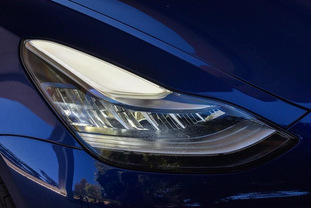 used 2022 Tesla Model 3 car, priced at $24,995