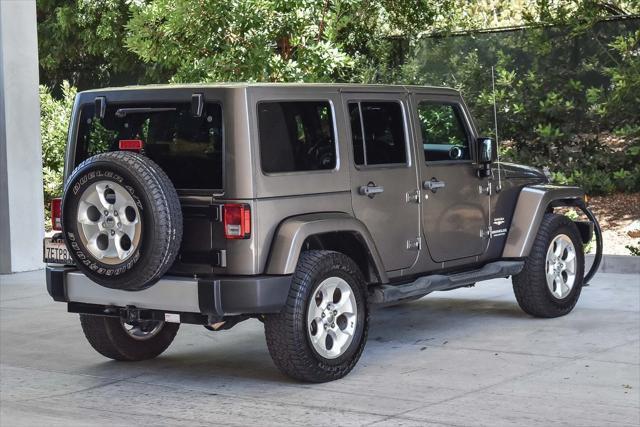 used 2014 Jeep Wrangler Unlimited car, priced at $18,995