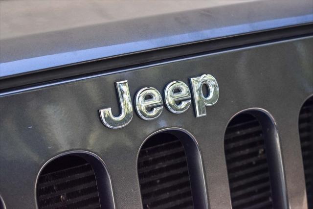 used 2014 Jeep Wrangler Unlimited car, priced at $18,995