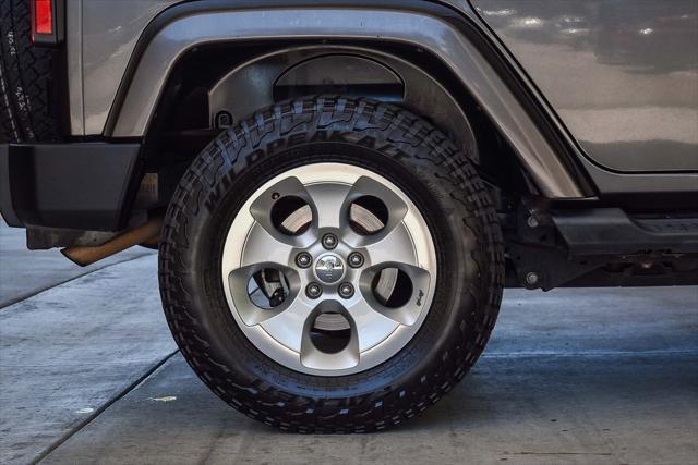 used 2014 Jeep Wrangler Unlimited car, priced at $18,995
