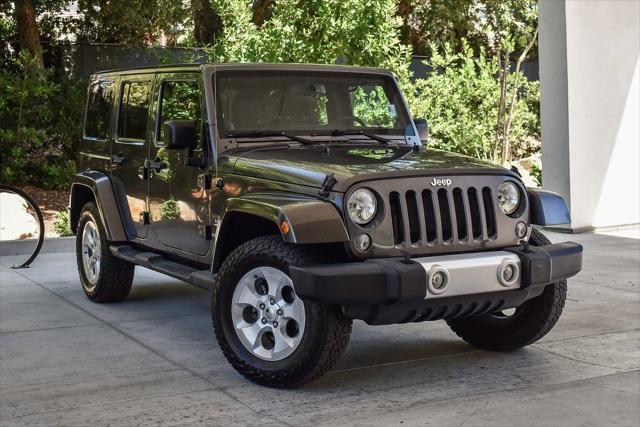 used 2014 Jeep Wrangler Unlimited car, priced at $18,995