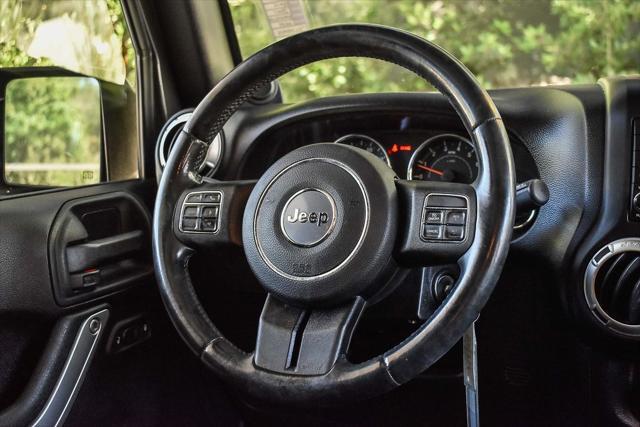 used 2014 Jeep Wrangler Unlimited car, priced at $18,995