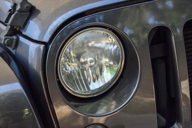 used 2014 Jeep Wrangler Unlimited car, priced at $18,995