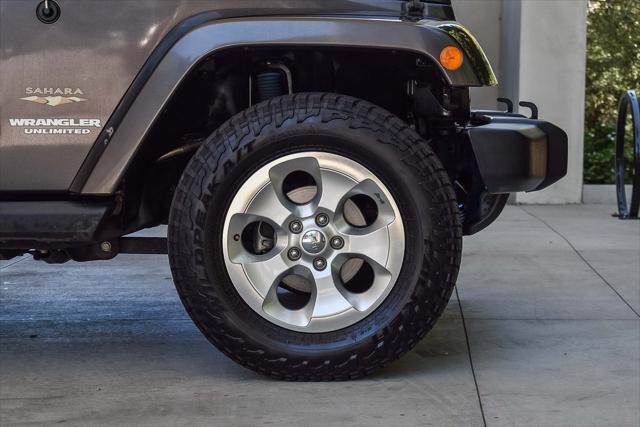 used 2014 Jeep Wrangler Unlimited car, priced at $18,995