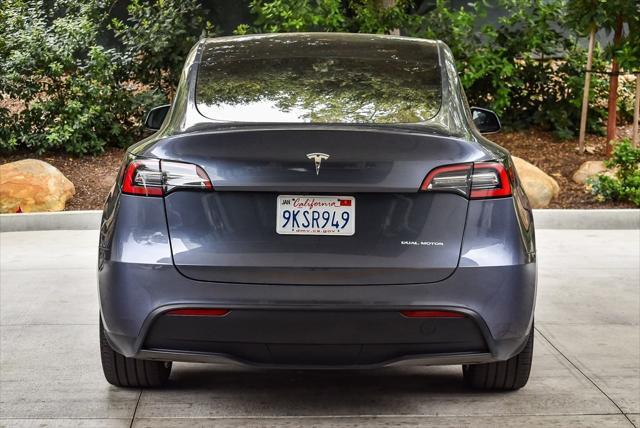 used 2023 Tesla Model Y car, priced at $33,995