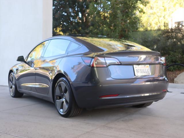 used 2023 Tesla Model 3 car, priced at $28,500