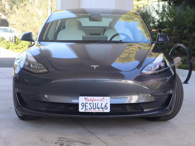 used 2023 Tesla Model 3 car, priced at $28,500