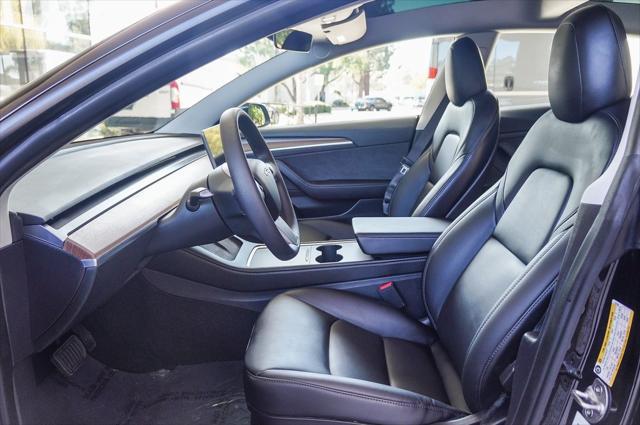 used 2022 Tesla Model 3 car, priced at $27,500