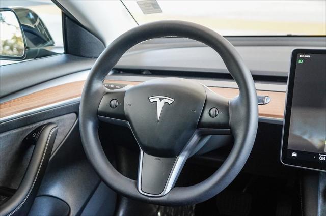 used 2022 Tesla Model 3 car, priced at $27,500