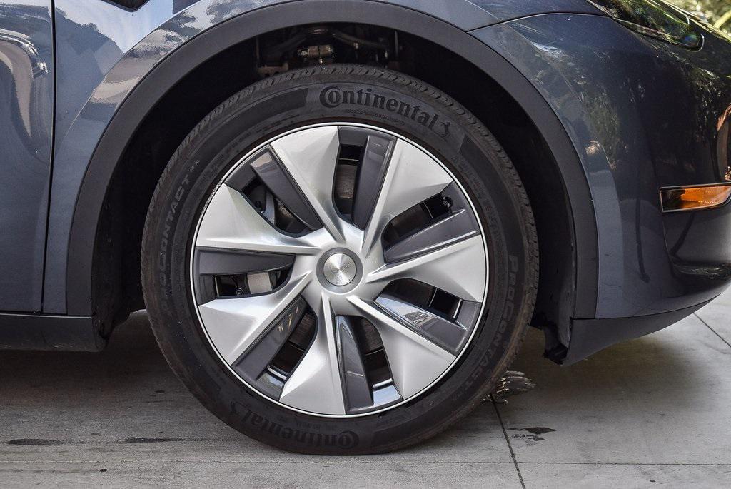 used 2023 Tesla Model Y car, priced at $33,500