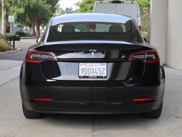 used 2022 Tesla Model 3 car, priced at $27,995