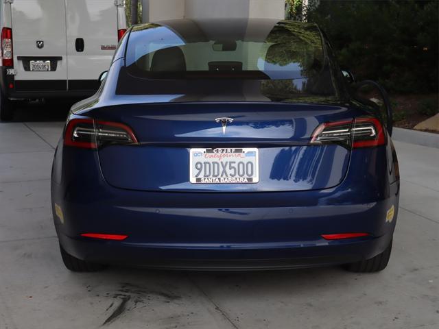 used 2022 Tesla Model 3 car, priced at $27,995