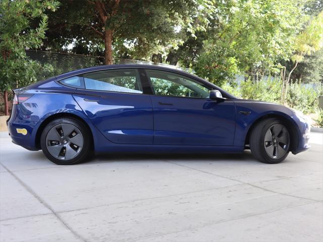 used 2022 Tesla Model 3 car, priced at $27,995