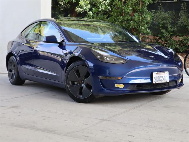 used 2022 Tesla Model 3 car, priced at $27,995