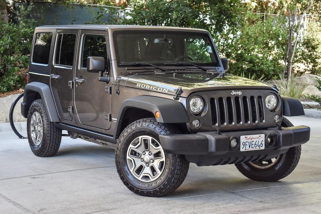 used 2018 Jeep Wrangler JK Unlimited car, priced at $23,995