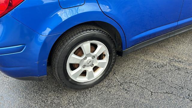 used 2009 Nissan Versa car, priced at $5,801