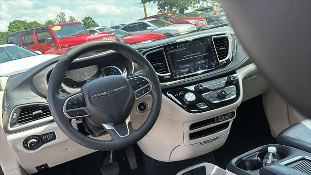 used 2023 Chrysler Pacifica Hybrid car, priced at $24,219