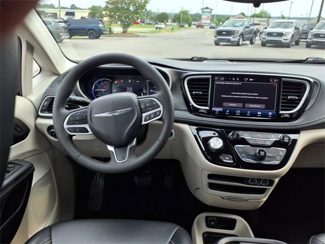 used 2023 Chrysler Pacifica Hybrid car, priced at $29,911