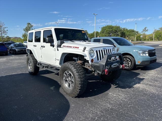 used 2013 Jeep Wrangler Unlimited car, priced at $25,163