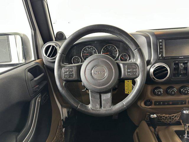 used 2013 Jeep Wrangler Unlimited car, priced at $19,198