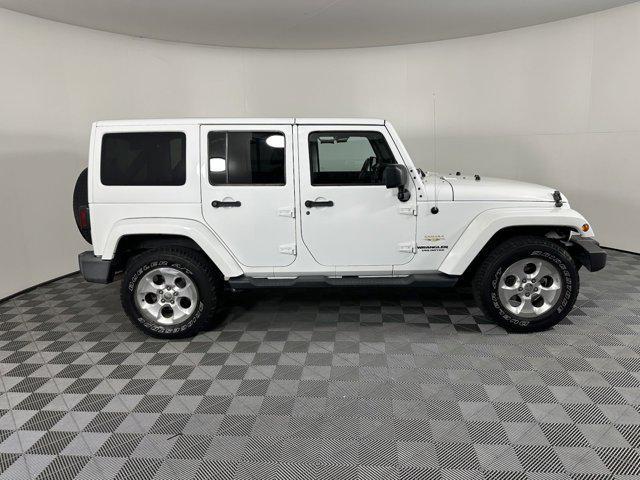 used 2013 Jeep Wrangler Unlimited car, priced at $19,198