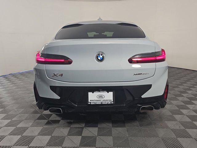 used 2022 BMW X4 car, priced at $32,999