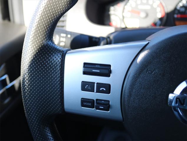 used 2013 Nissan Frontier car, priced at $16,393