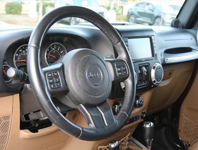 used 2013 Jeep Wrangler Unlimited car, priced at $16,604