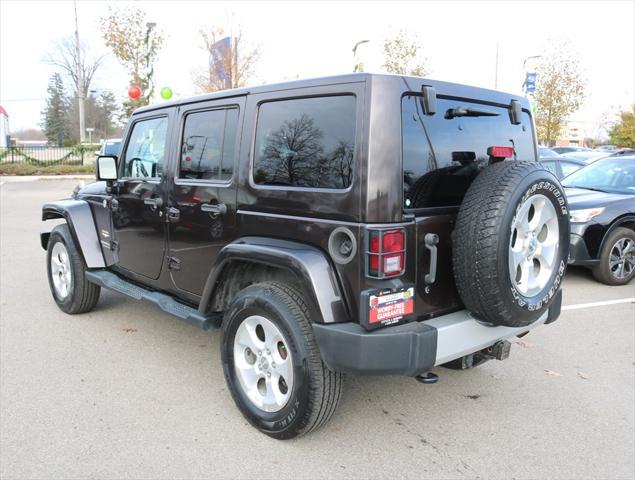 used 2013 Jeep Wrangler Unlimited car, priced at $16,604