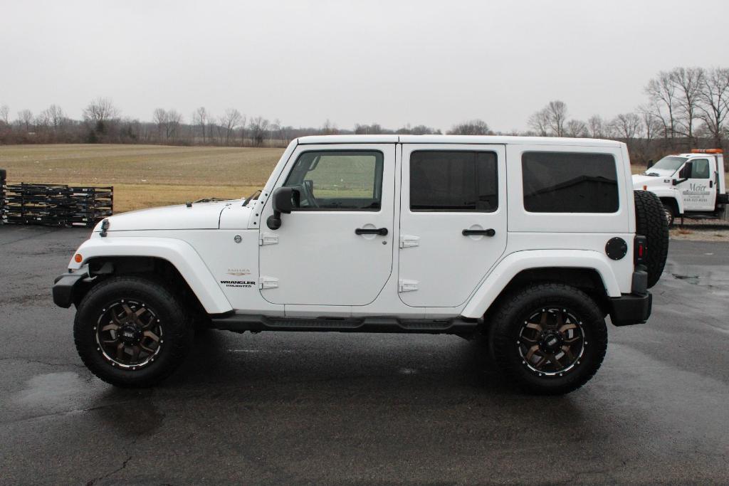 used 2012 Jeep Wrangler Unlimited car, priced at $13,973