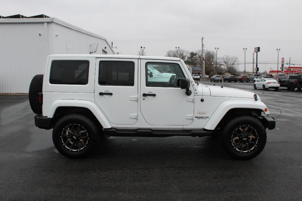 used 2012 Jeep Wrangler Unlimited car, priced at $13,973