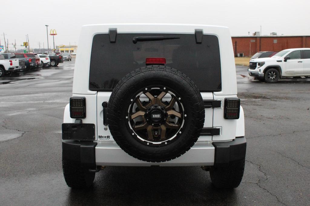 used 2012 Jeep Wrangler Unlimited car, priced at $13,973