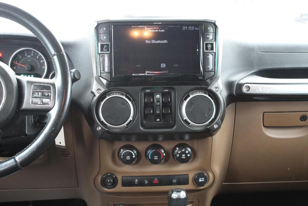 used 2012 Jeep Wrangler Unlimited car, priced at $13,973