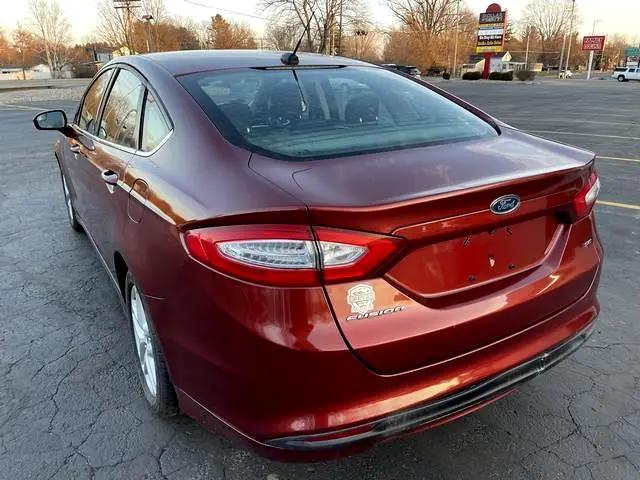 used 2014 Ford Fusion car, priced at $7,995