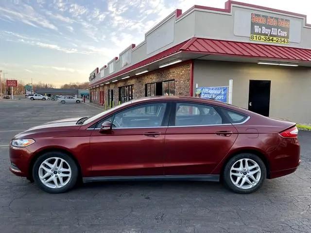 used 2014 Ford Fusion car, priced at $7,995