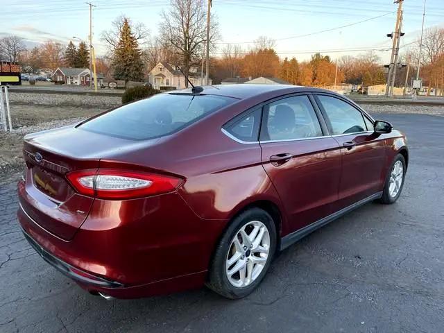 used 2014 Ford Fusion car, priced at $7,995